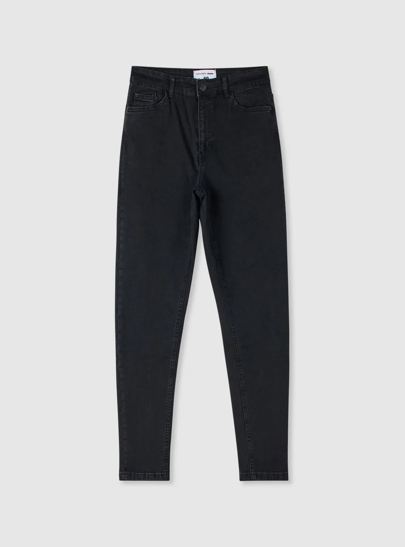 Jeans skinny a tinta unita