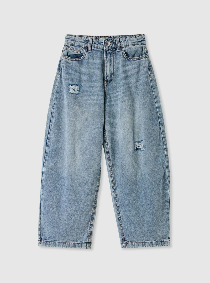Jeans balloon con strappi