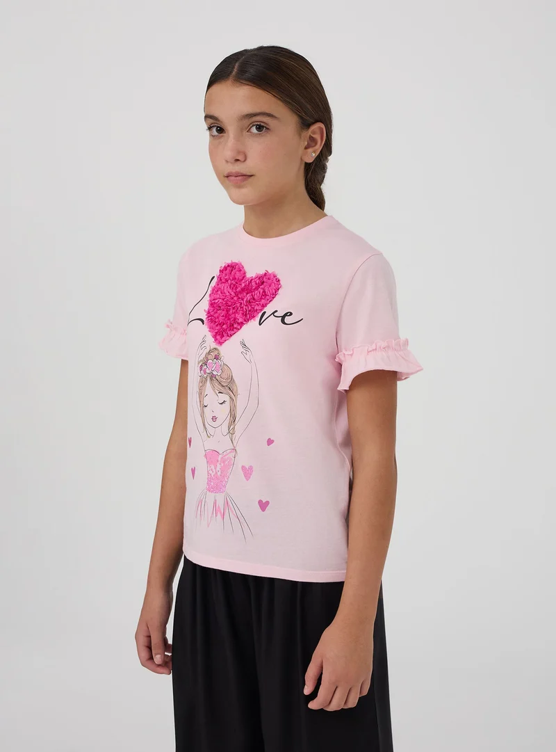 T-shirt stampa bambola con applicazioni
