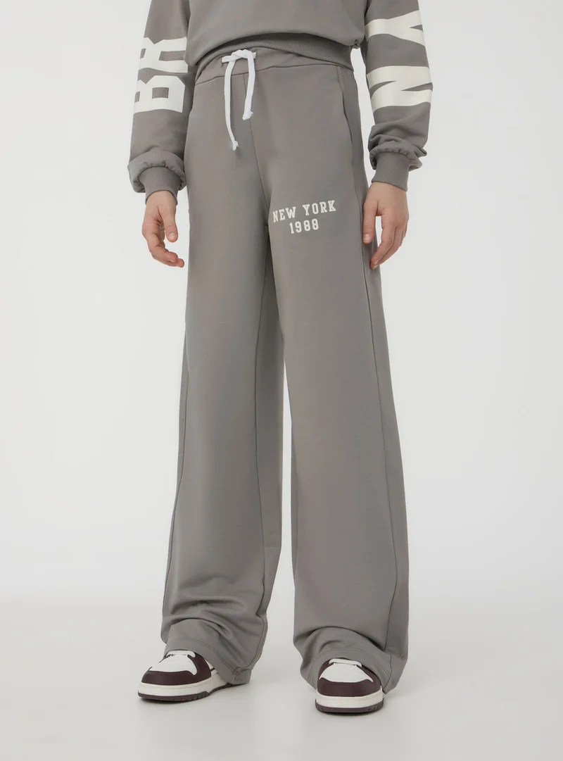 Pantaloni wide leg con stampa