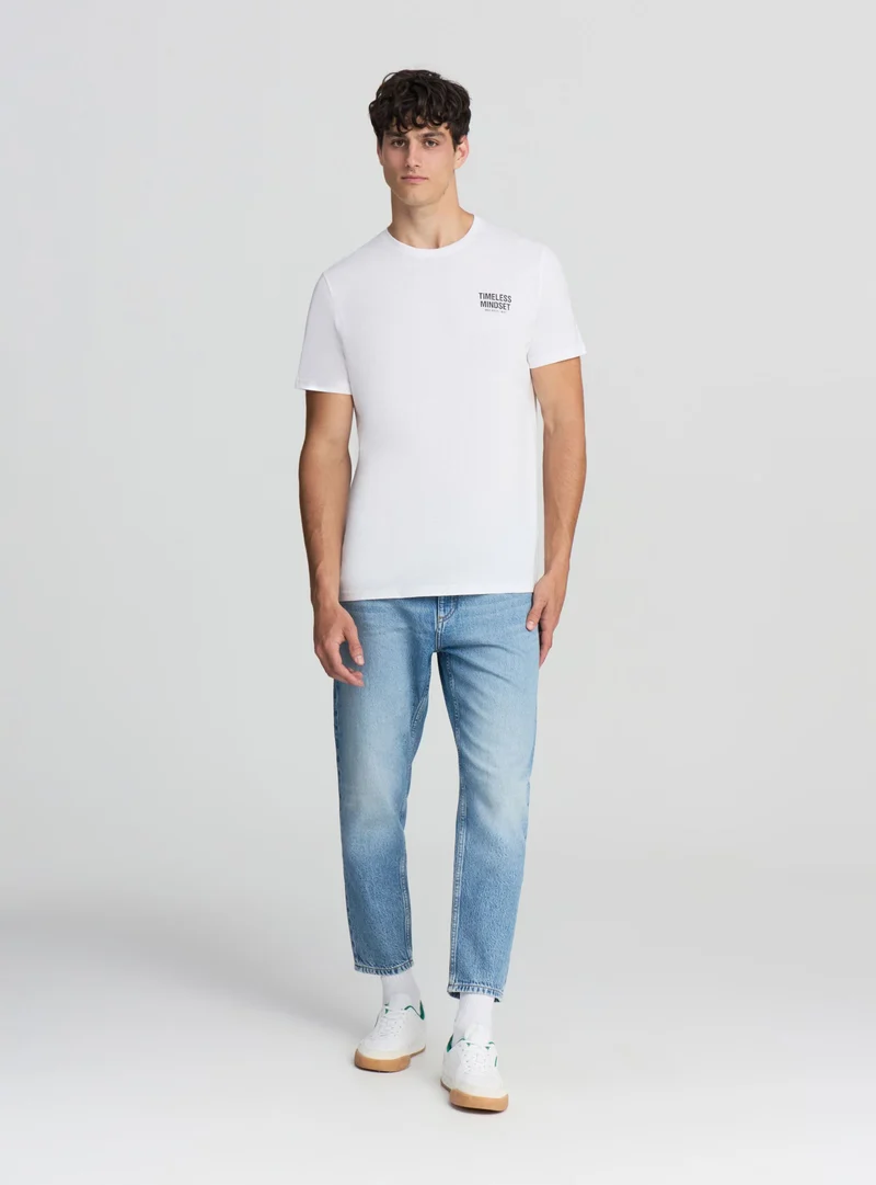 T-shirt con scritta fronte/retro