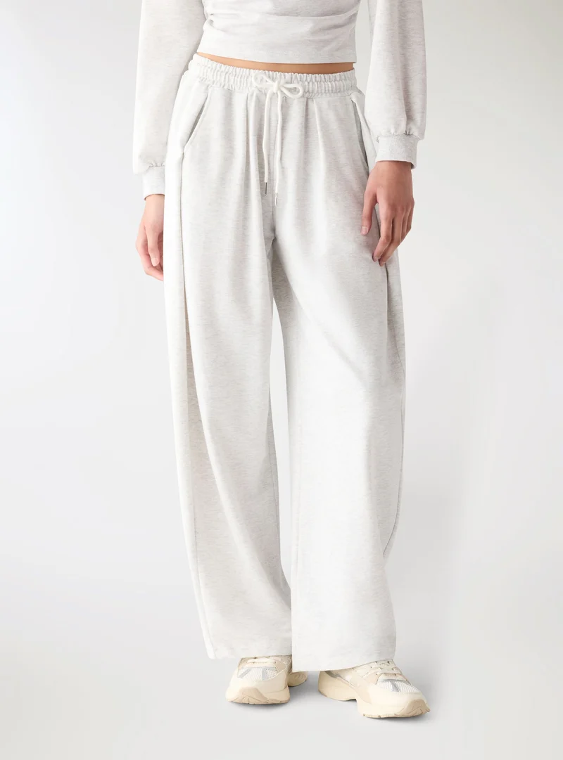 Pantaloni tuta wide leg taglio ampio con coulisse