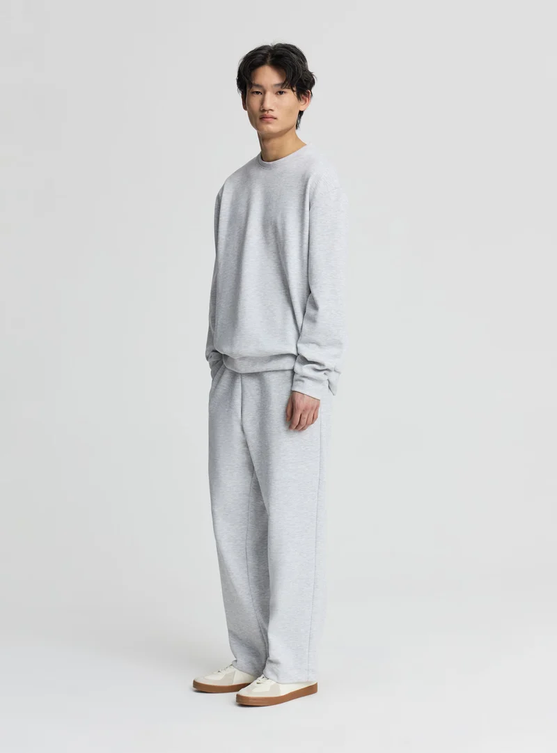 Pantaloni tuta elegante a tinta unita