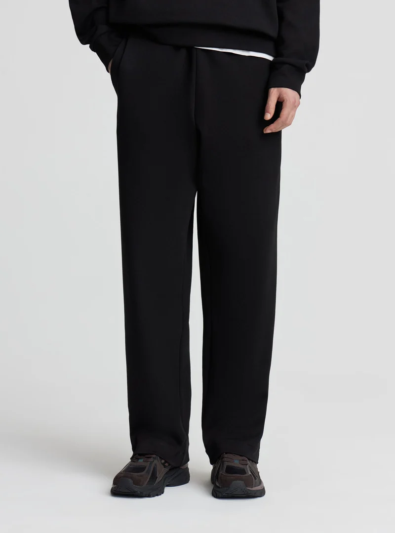 Pantaloni tuta elegante a tinta unita