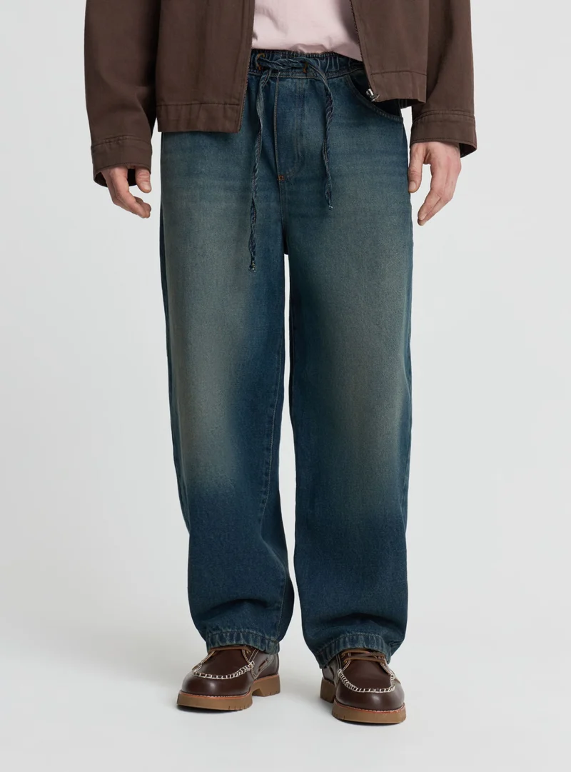 Jeans jogger balloon a tinta unita