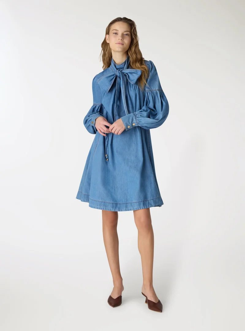 Vestito svasato con fiocco e cintura