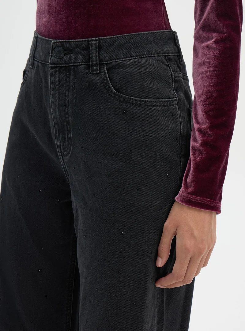 Jeans wide leg con strass