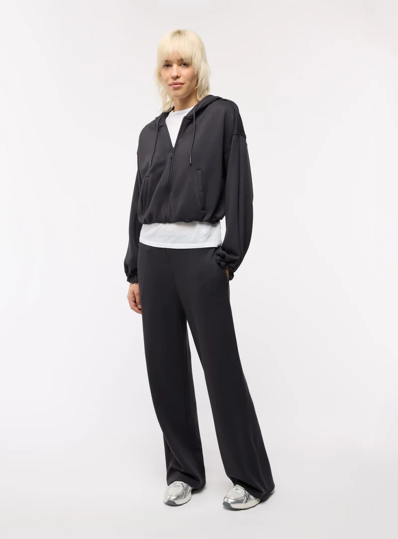 Pantaloni tuta ampi a tinta unita con elastico