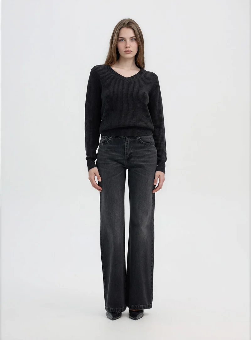 Jeans bootcut a tinta unita