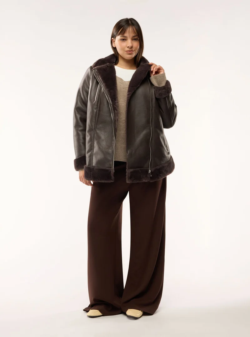 Giacca con collo effetto peluche e zip