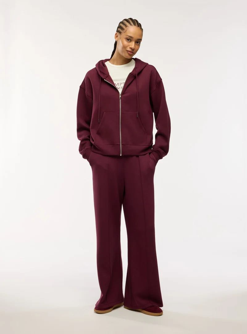 Pantaloni tuta wide leg a tinta unita
