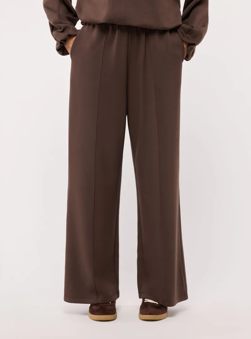 Pantaloni tuta wide leg a tinta unita