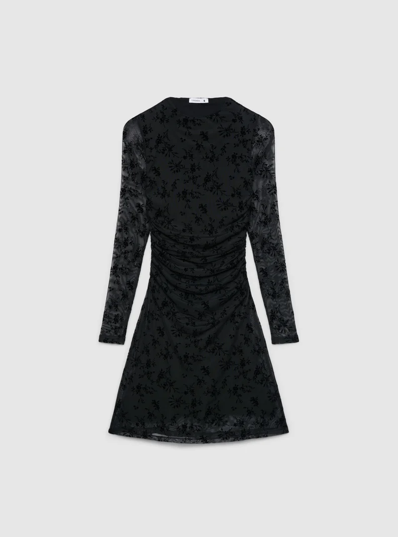 Vestito aderente con arricciature e stampa floreale