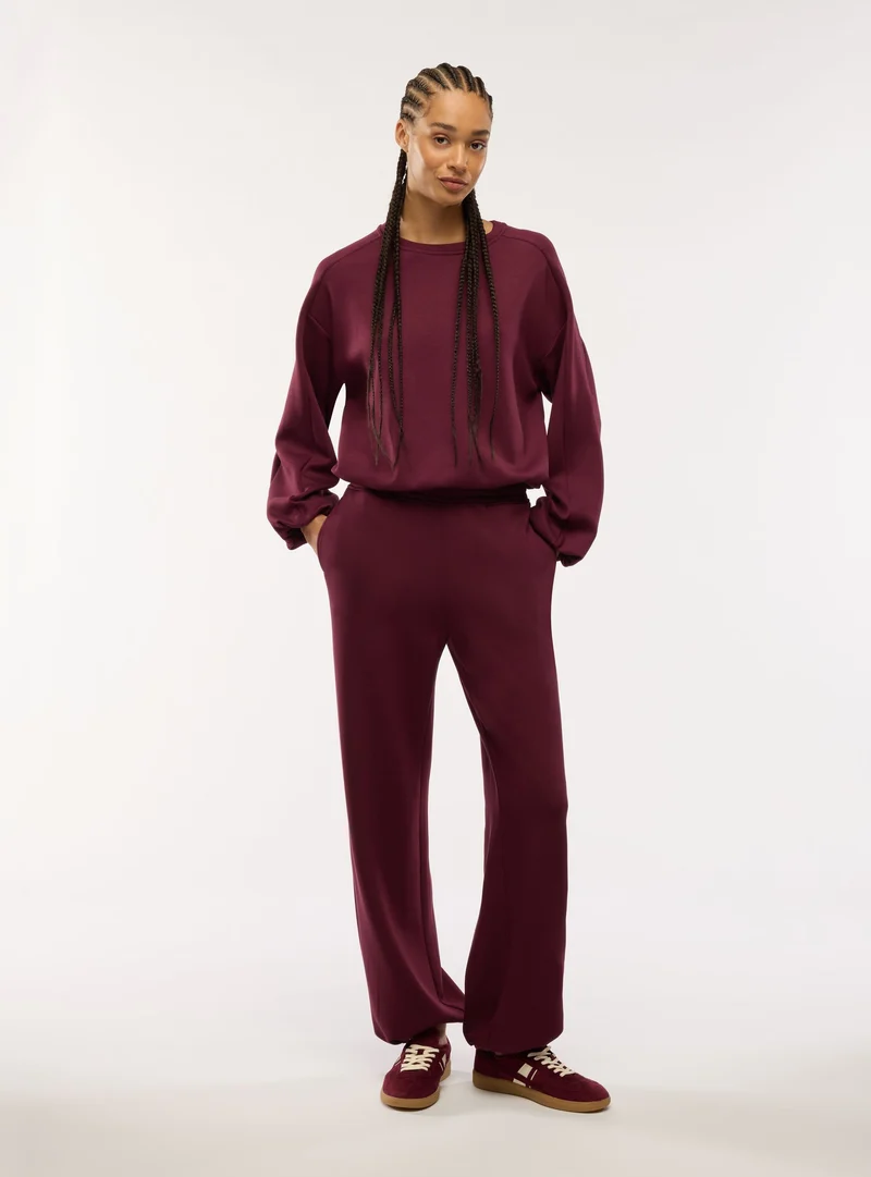 Pantaloni tuta ampi con elastico al fondo