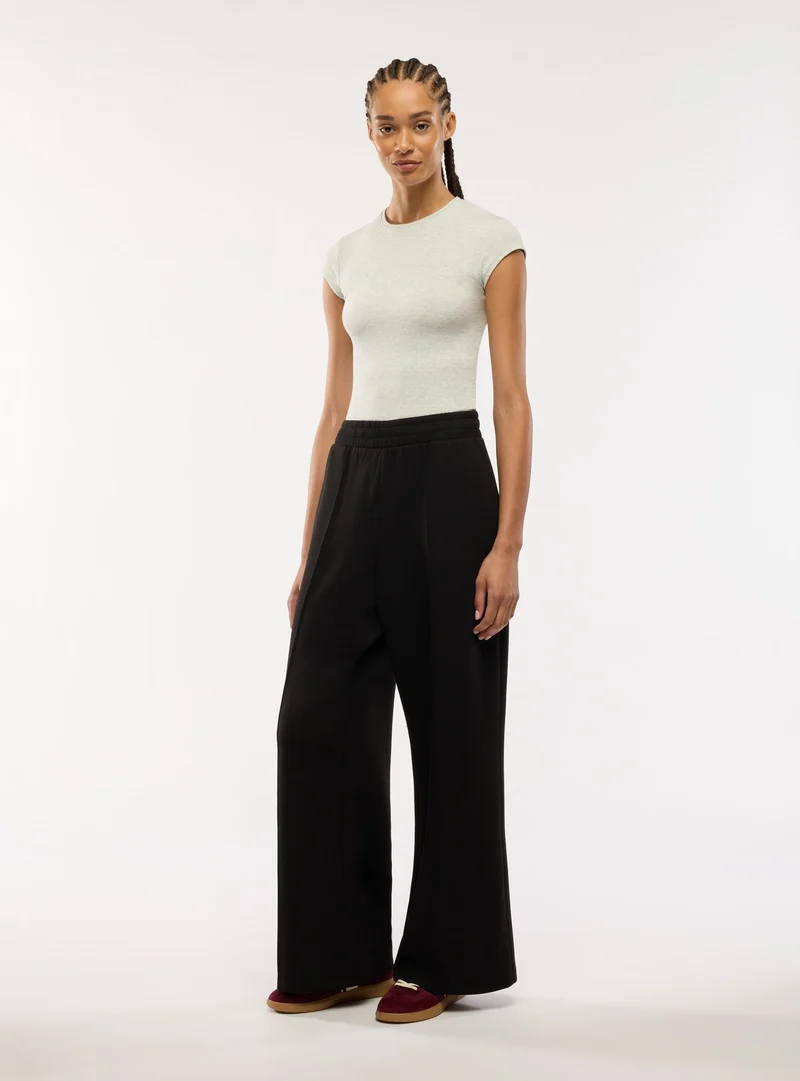 Pantaloni tuta wide leg a tinta unita