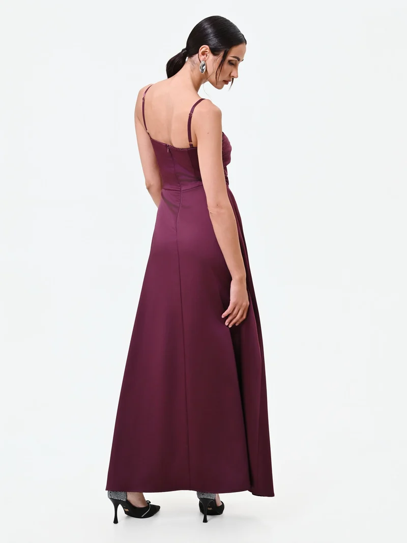 Abito lungo bordeaux con maxi fiocco