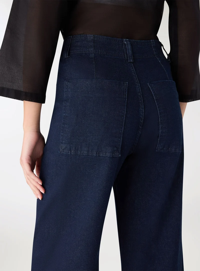Jeans wide leg a tinta unita