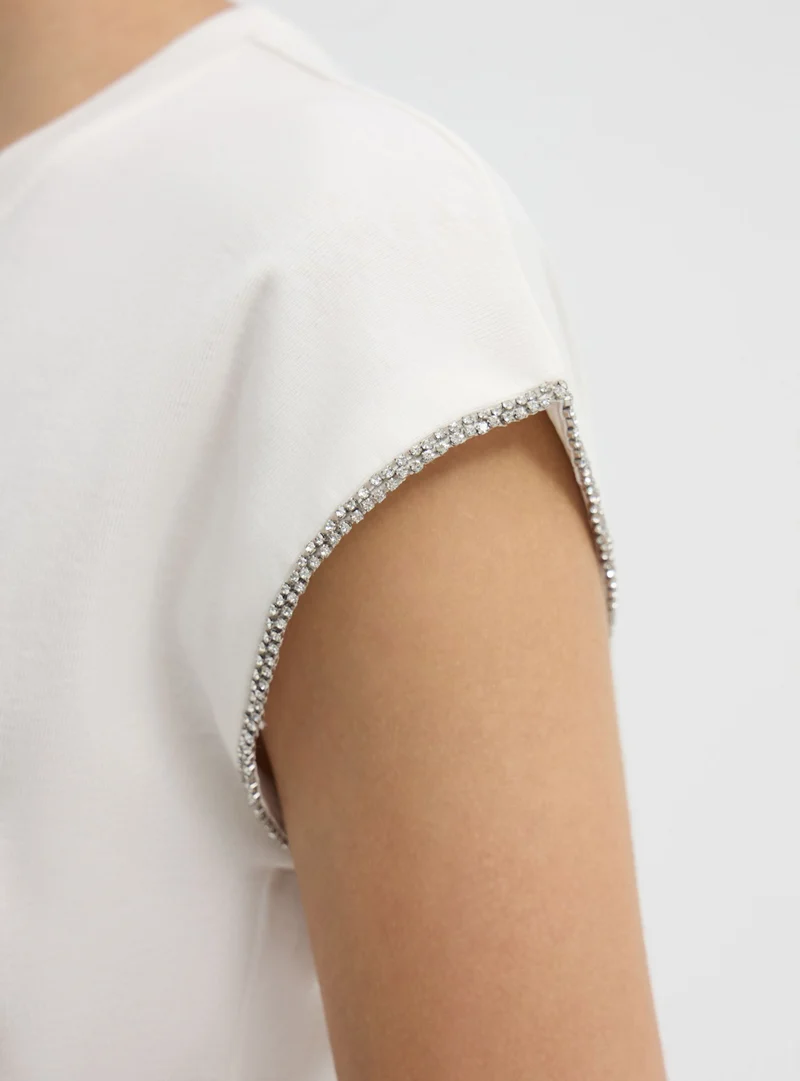 T-shirt con profili maniche strass