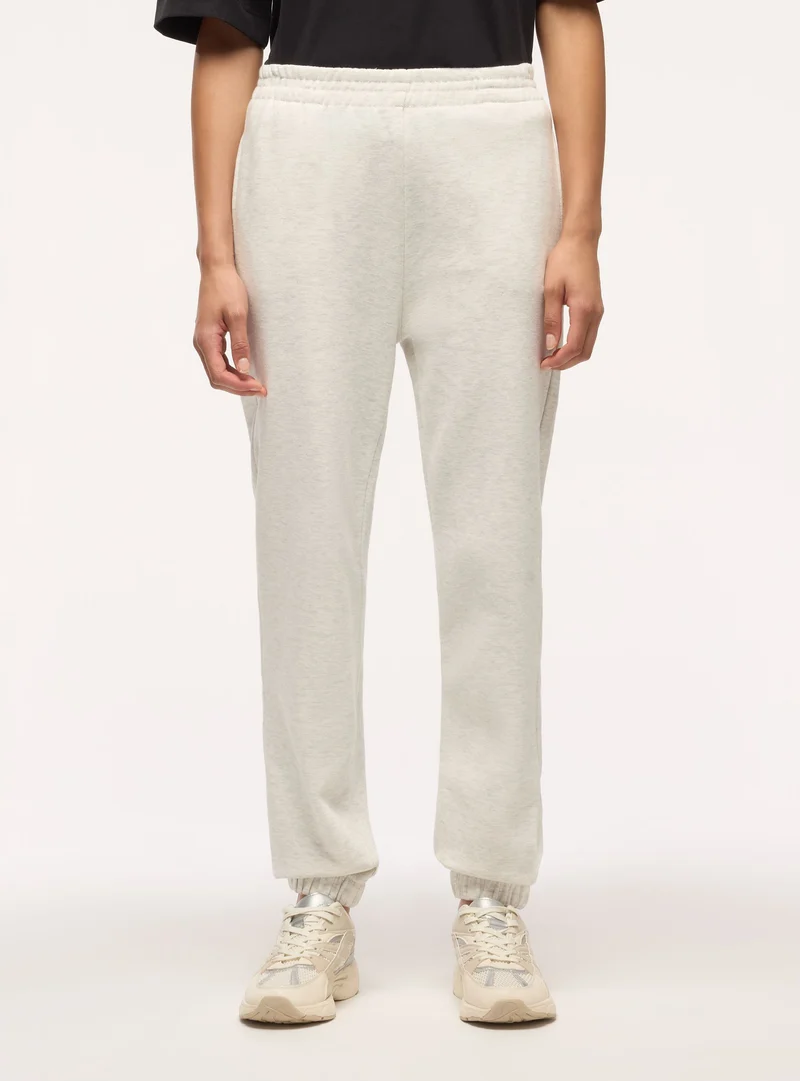 Pantaloni tuta lunghi con elastico