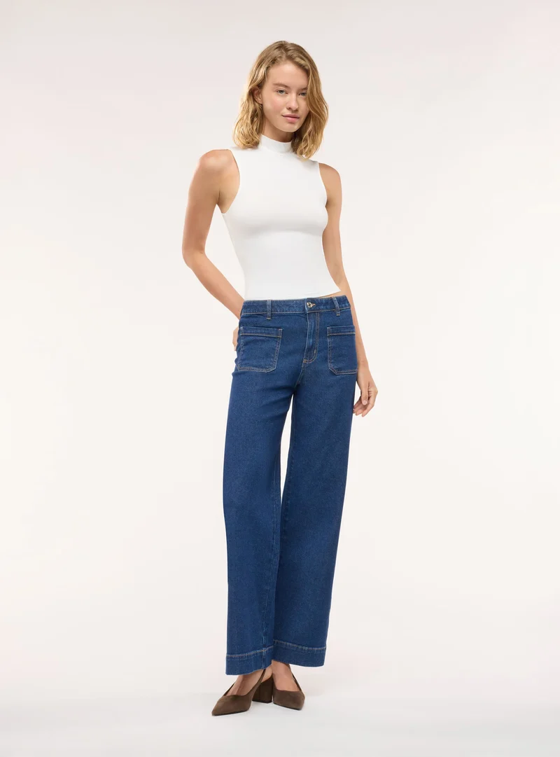 Jeans wide leg con tasche applicate