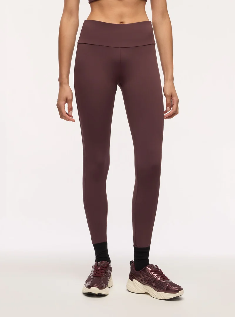 Leggings sportivi con inserti in tulle