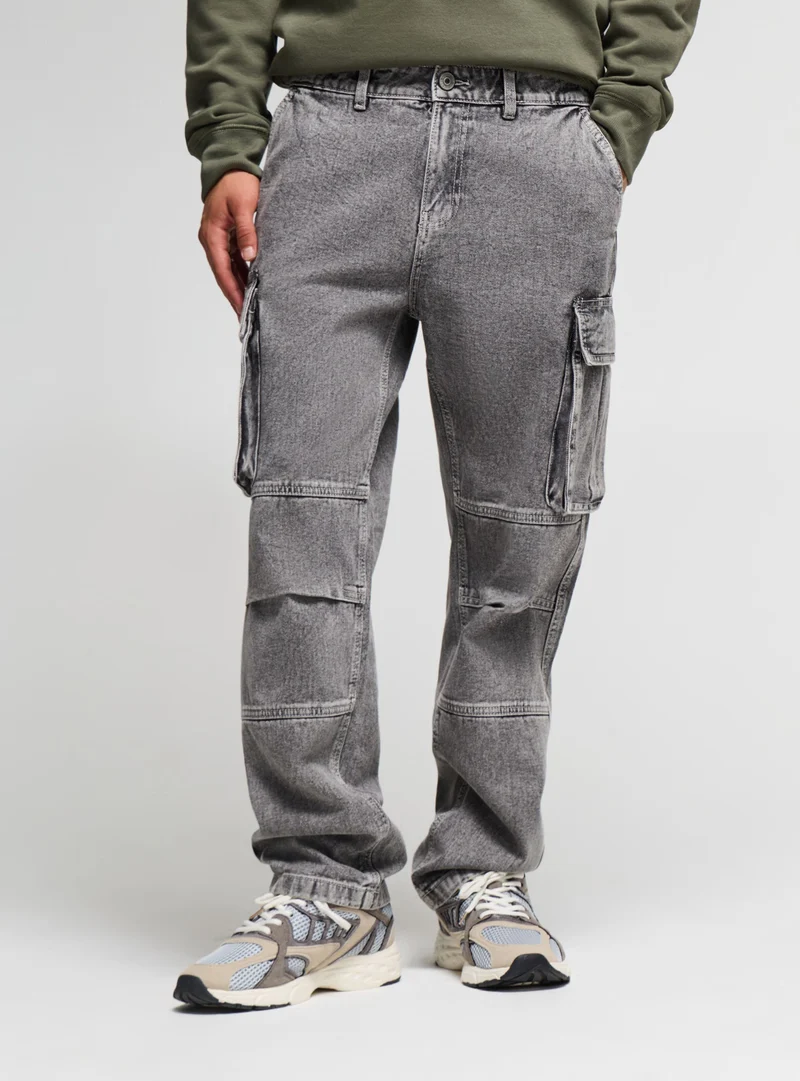 Jeans over cargo a tinta unita