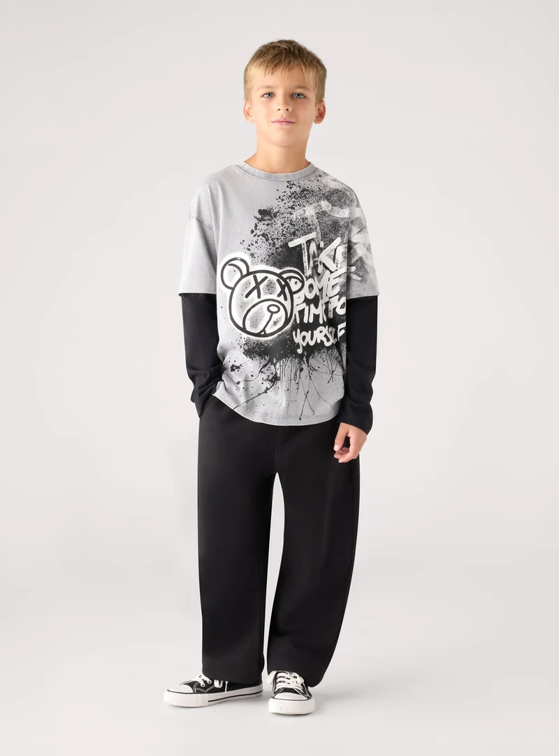 T-shirt manica lunga con stampa graffiti