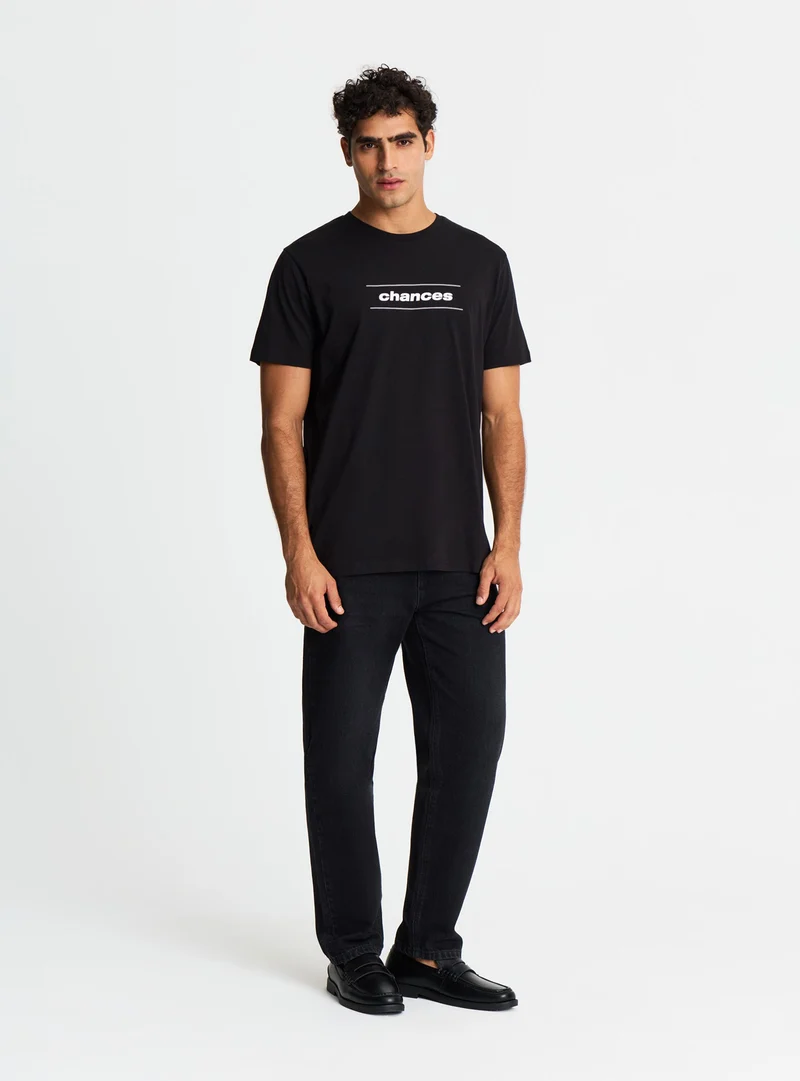 T-shirt con stampa lettering