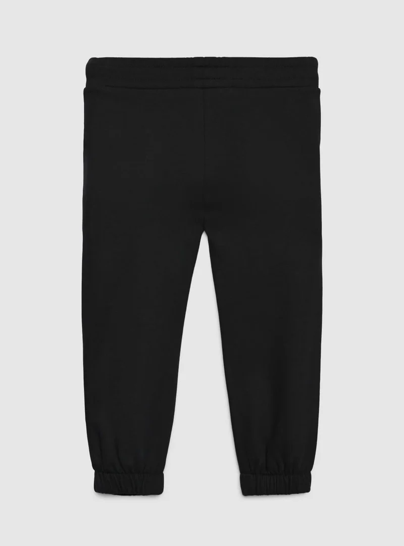 Pantaloni tuta lunghi con elastico e polsini