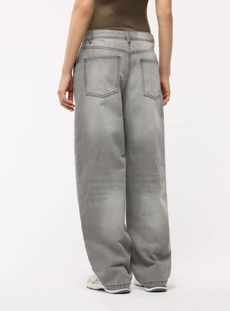 Jeans baggy a tinta unita