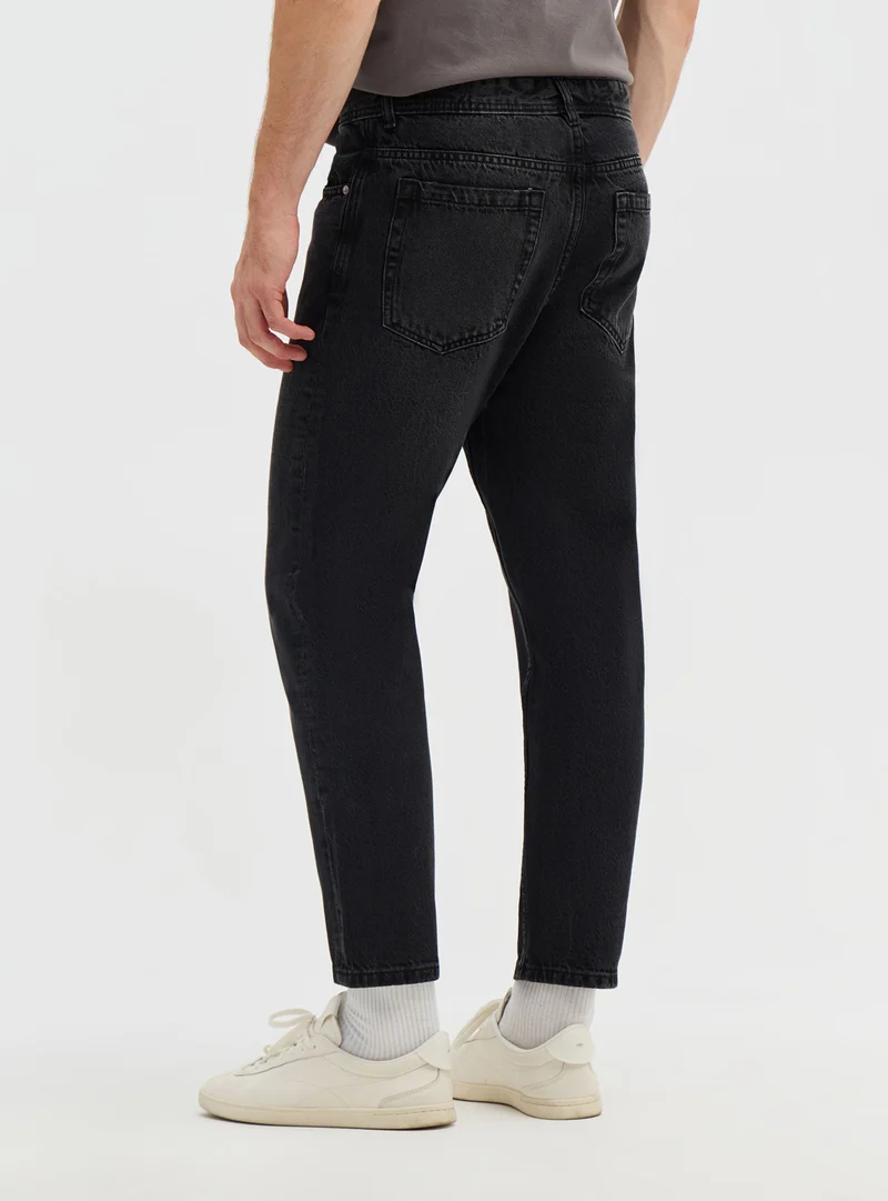 Jeans relaxed a tinta unita