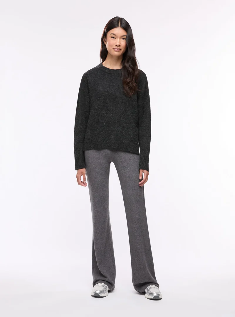 Leggings lunghi a zampa con baschina