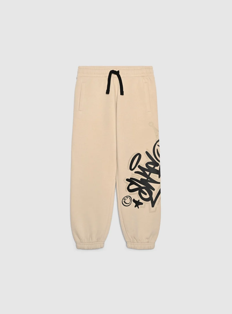 Pantaloni tuta lunghi con stampa graffiti