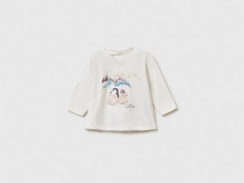 T-shirt con stampa glitterata