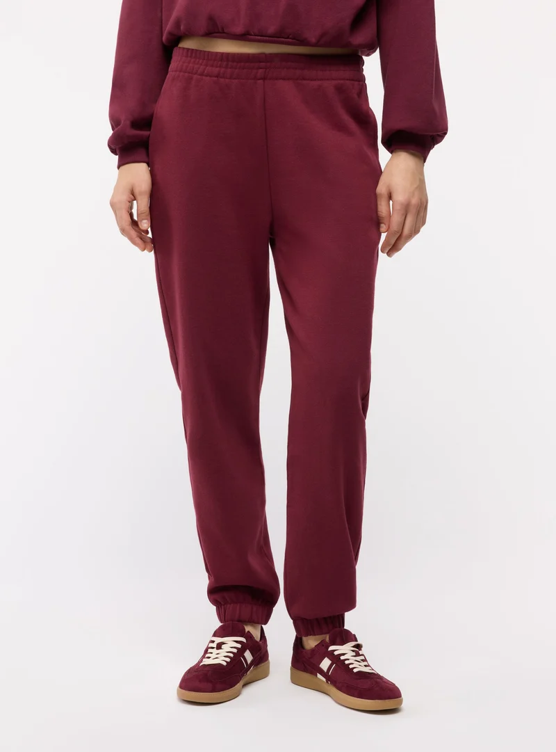 Pantaloni tuta lunghi con elastico