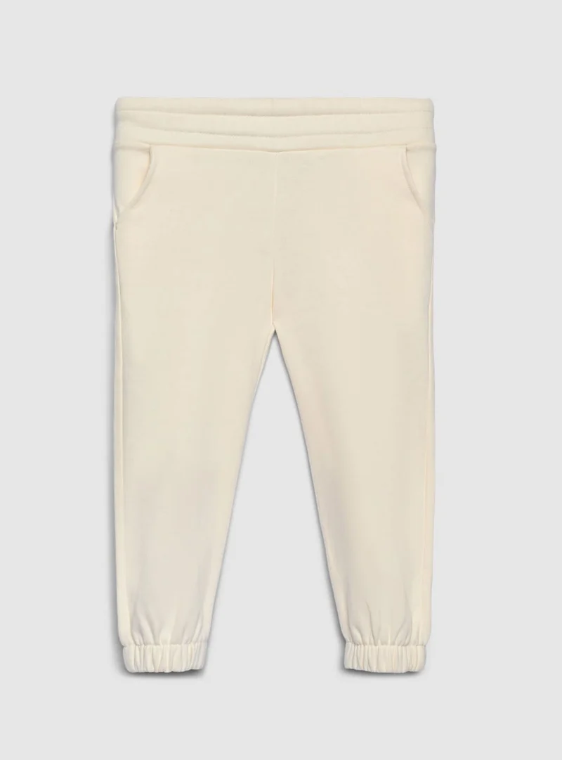 Pantaloni tuta lunghi con elastico e polsini