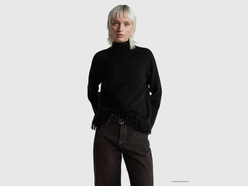 Maglione dolcevita over fit con frange