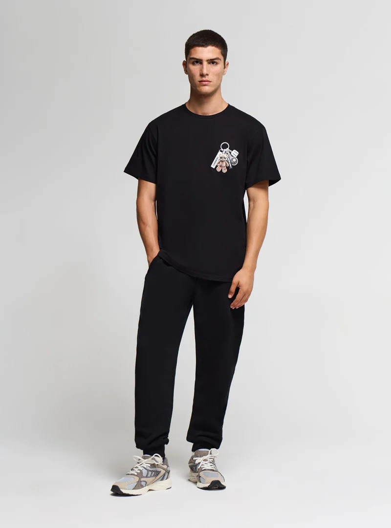 T-shirt con stampa orsetto e scritta