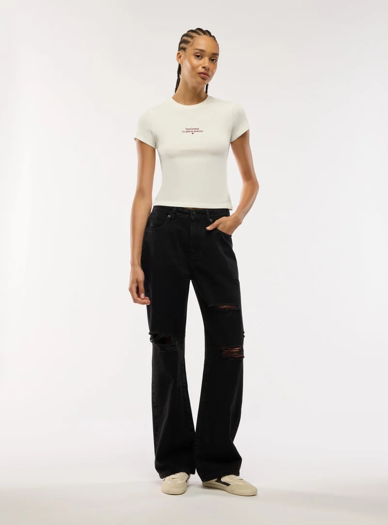 Jeans wide leg con strappi