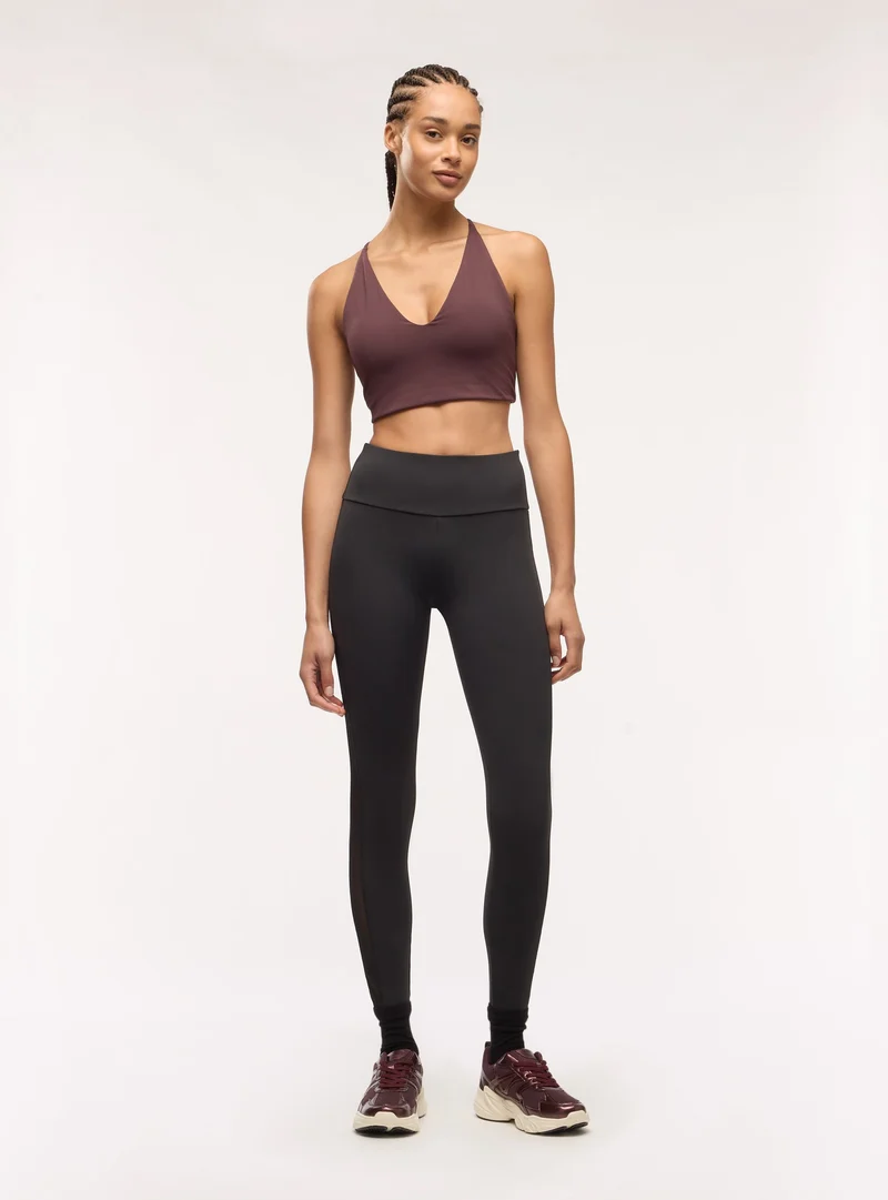 Leggings sportivi con inserti in tulle