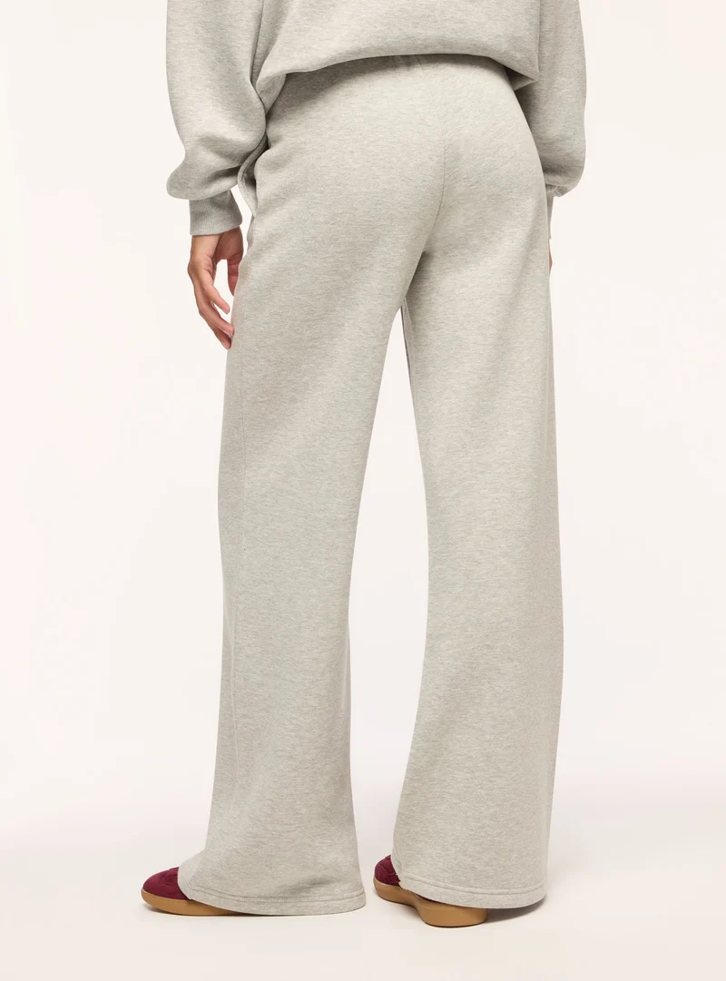 Pantaloni tuta wide leg con ricamo college