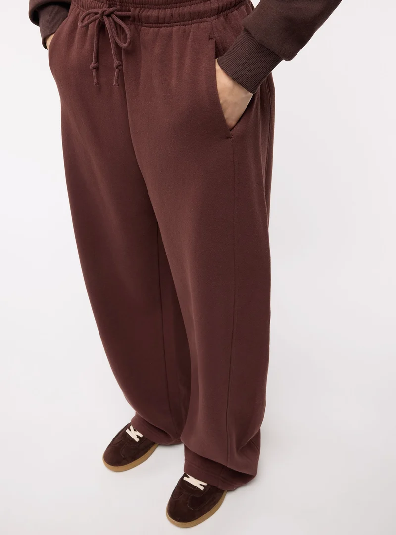 Pantaloni tuta lunghi tinta unita