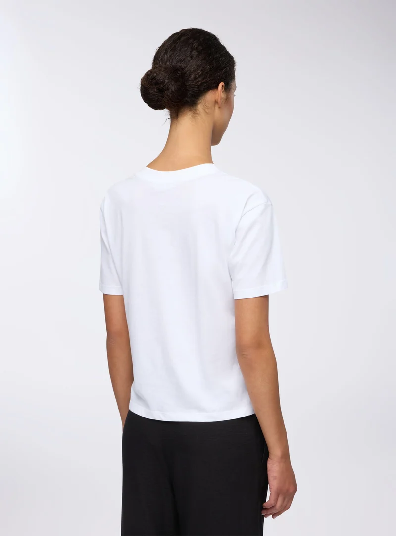 T-shirt con spacchi