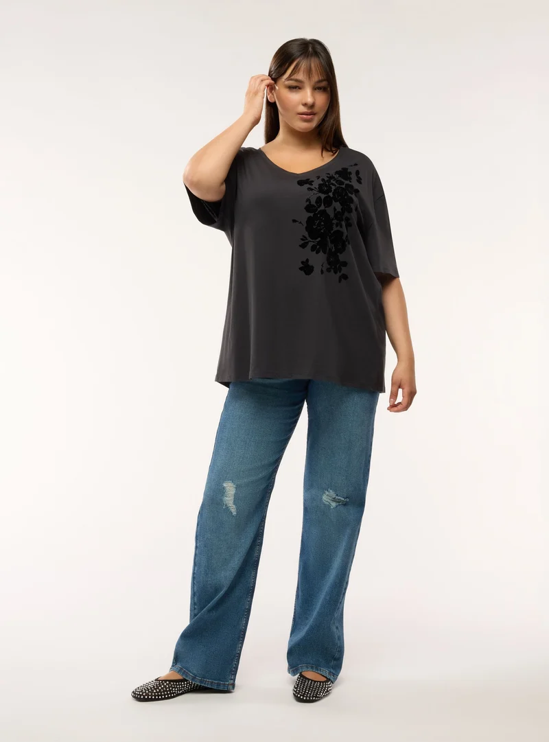 T-shirt con scollo a V e stampa floreale