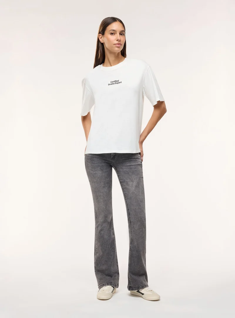 T-shirt ampia con stampa graffiti
