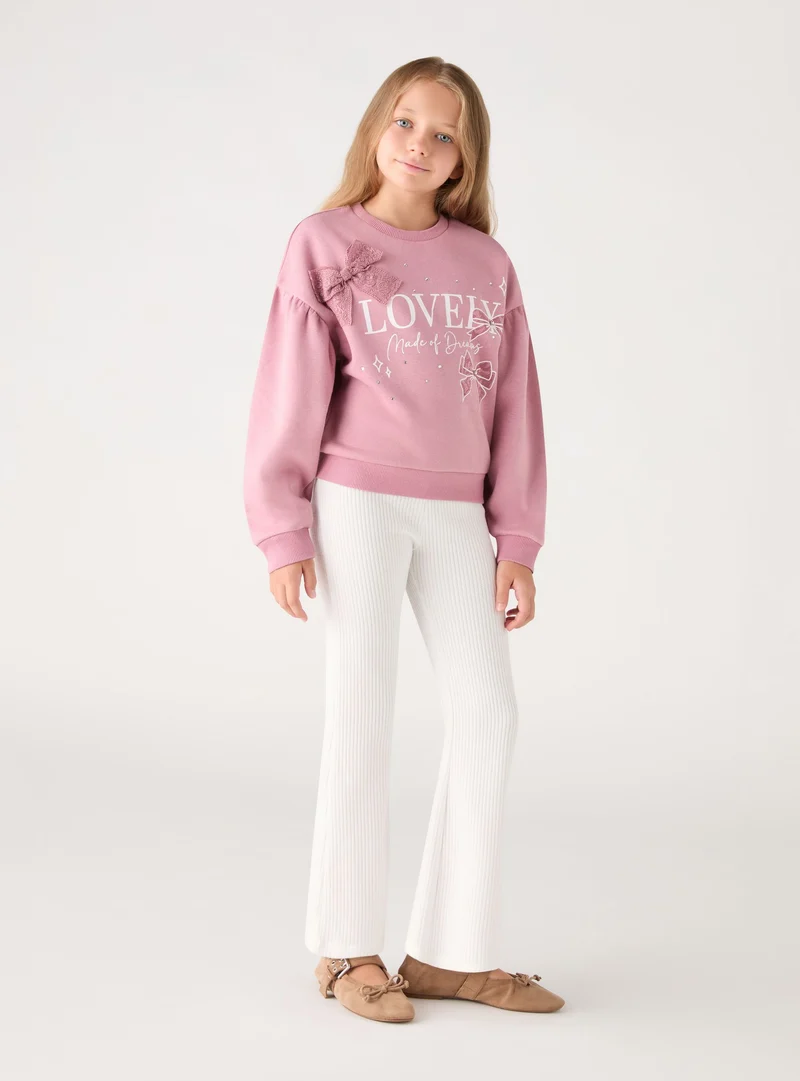 Leggings lunghi a costine svasati