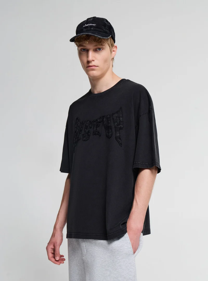 T-shirt boxy con stampa patch