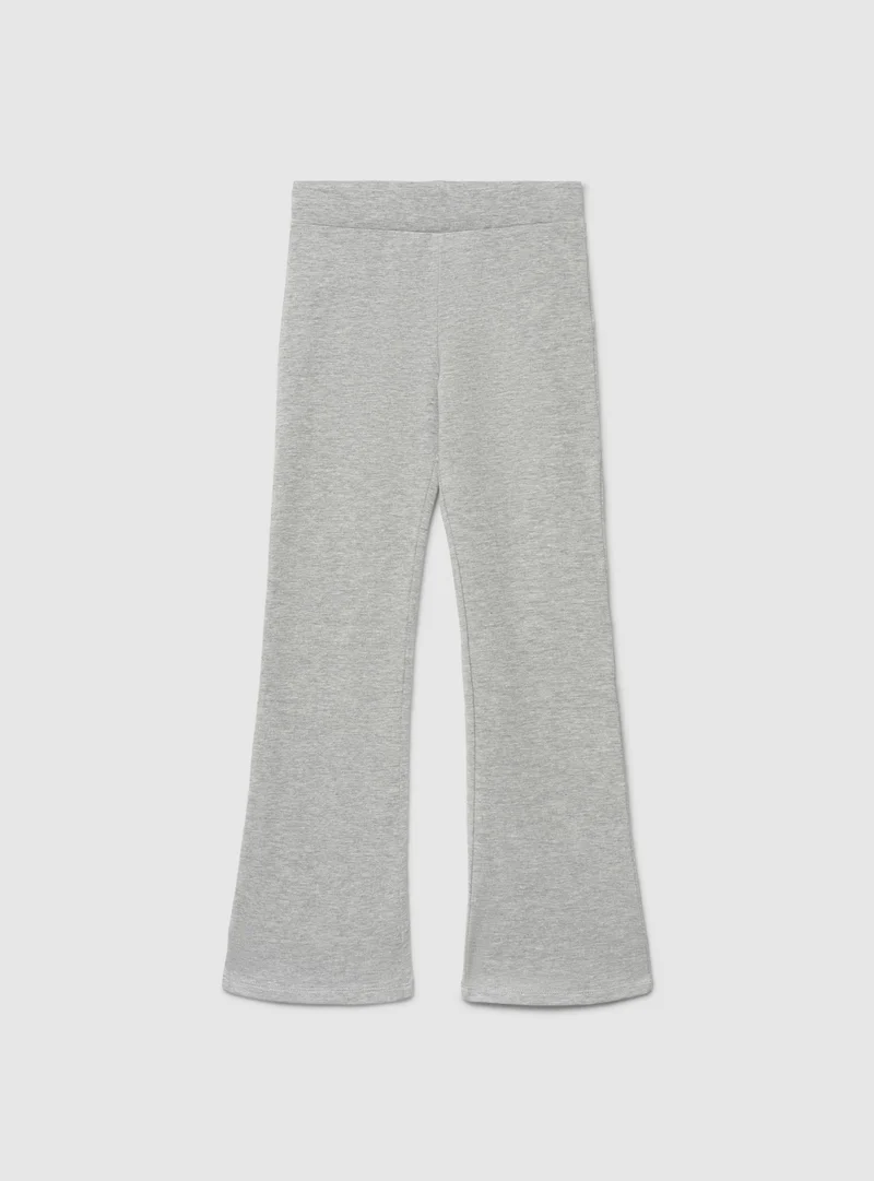 Leggings lunghi a zampa tinta unita