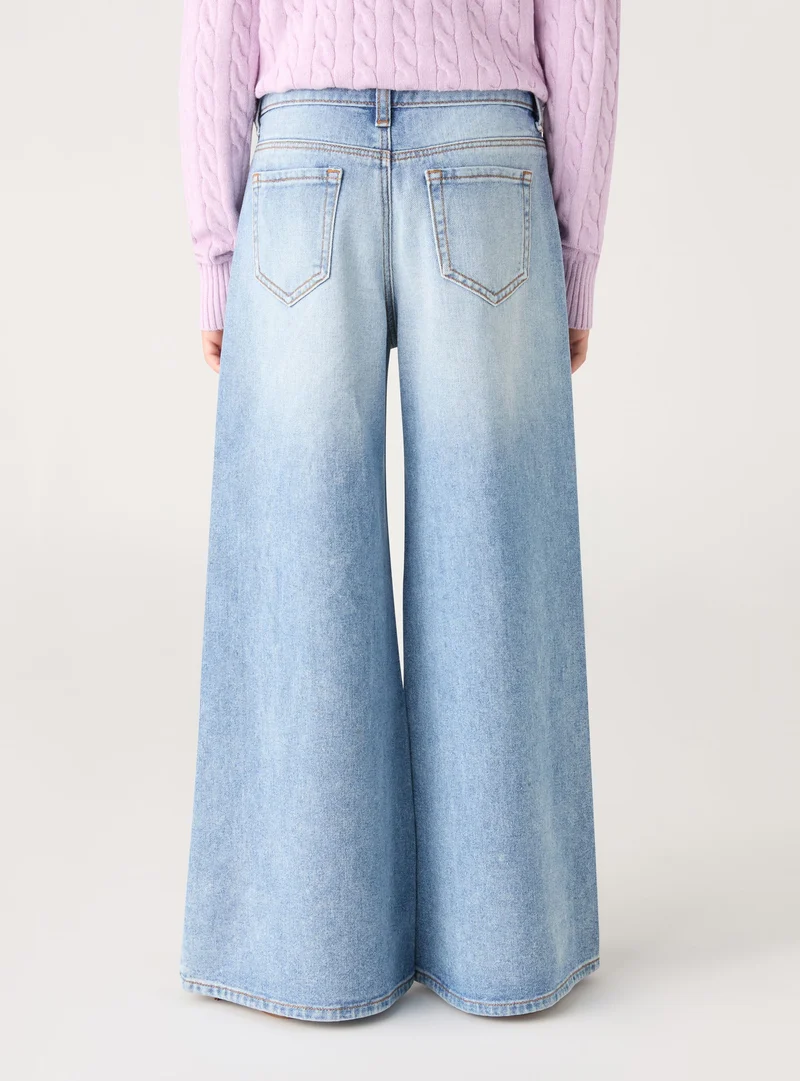 Jeans maxi super wide leg con strass e strappi