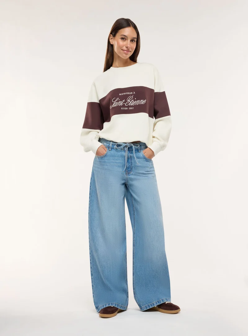 Jeans super wide leg con coulisse
